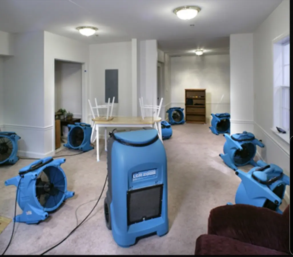 Air movers and dehumidifier setup for Water Damage Restoration in Fulshear